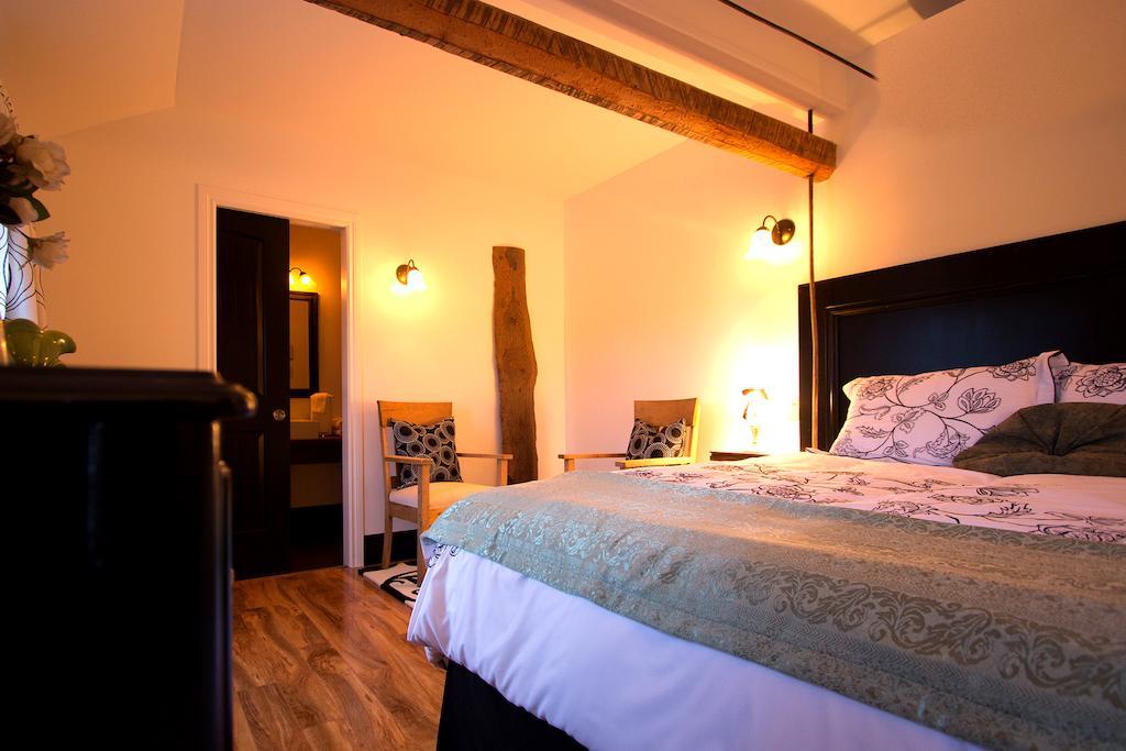 Les Ancetres Auberge & Restaurant St-Pierre-de-l'Île-d'Orléans Rom bilde